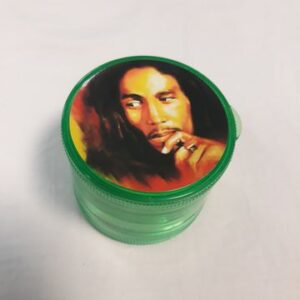 Зелен пластмасов гриндер Bob Marley с портрет на капака