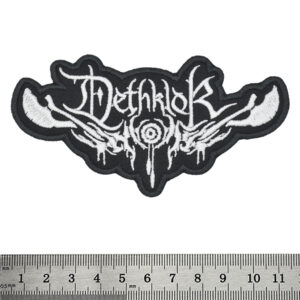 Малка бродирана нашивка на Dethklok с бяло лого на черен фон, тип Metalocalypse пач.
