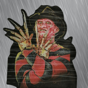 3D стикер Nightmare on Elm Street хорър стикер с Фреди Крюгер от Кошмарът на Елм Стрийт върху метализиран фон.