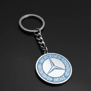 томанен ключодържател с кръглото синьо лого на Mercedes-Benz
