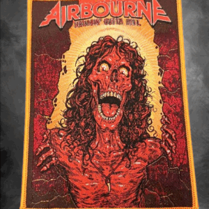 Нашивка с обложката на албума Airbourne "Breakin' Outta Hell", изобразяваща свиреп, горящ звяр с червена коса