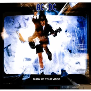 Матов самозалепващ малък плакат стикер AC/DC Blow Up Your Video с Ангъс Йънг на телевизионен екран